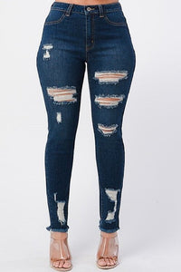 FRAYED BOTTOM DISTRESSED JEANS